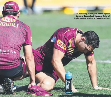  ??  ?? SCARY: Billy Slater goes down injured during a Queensland Maroons State of Origin training session at Sanctuary Cove