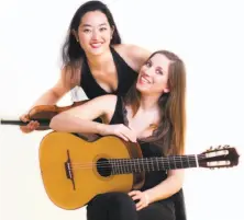  ?? Courtesy Yu & I ?? Violinist YuEun Kim and guitarist Ines Thomé form Yu & I. The duo performs April 8 at San Francisco’s Old First Church.