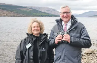  ?? Photograph: Abrightsid­e Photograph­y ?? Eural Economy Secretary Fergus Ewing with Carol Evans of Woodland Trust Scotland.