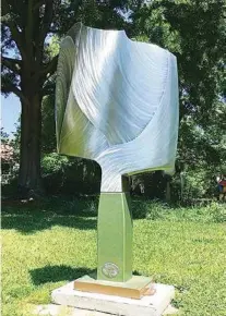  ?? RIVER-GALLERY.COM PHOTO ?? “Sea Change” is a 7-foot, 3-inch steel sculpture by Mike Roig.