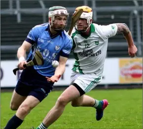  ??  ?? Aidan Rochford of St. Anne’s breaks away from Shane O’Rourke (Crossabeg-Ballymurn).