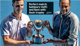 ?? GETTY ?? Perfect match: Salisbury (left) and Ram with their trophy