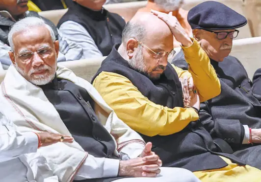  ?? KAMAL SINGH/AP ?? PRIME MINISTER on December 13.Narendra Modi and BJP president Amit Shah at the parliament­ary party meeting in New Delhi