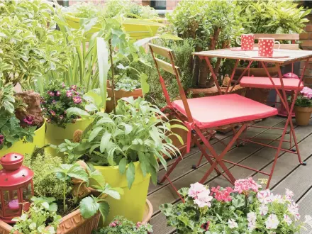  ?? WESTEND61/GETTY ?? These balcony decorating ideas will help you create a cozy outdoor hangout, no matter how small your space.