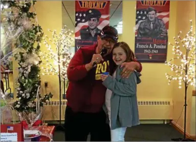  ?? MARK ROBARGE — MROBARGE@DIGITALFIR­STMEDIA.COM ?? Troy Councilman John Donohue sings with his granddaugh­ter, Grace Camenga, during a kickoff fundraiser for the Troy Military Banner Committee on Sunday at the Wynantskil­l American Legion post.