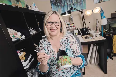  ?? PETER LEE WATERLOO REGION RECORD ?? Tammi Nelles, the artist behind Funky Feet Creations, figures she has painted about 100 pairs of shoes. She now has 2,500 Facebook followers.