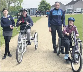  ?? (Pic: EOB-d) ?? Celebratin­g Bike Week were, l-r: TY student Ali O’Regan from Fermoy, Brian McDonnell from Mallow, TY student Tara Carey from Araglin and Janice Long from Mayfield.