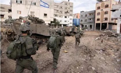  ?? ?? Israeli soldiers take part in a ground operation in Gaza City. Photograph: Moti Milrod/AP