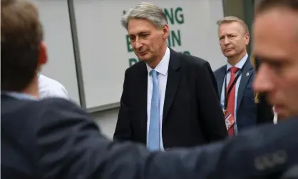  ??  ?? The chancellor of the exchequer, Philip Hammond, faces a growing crisis over productivi­ty and growth. Photograph: Paul Ellis/ AFP/Getty Images