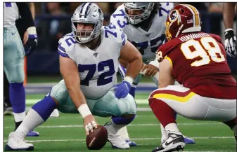  ??  ?? Dallas Cowboys center Travis Frederick (72) announced his retirement on Monday. Frederick, 29, a five-time Pro Bowler, cited a nerve disorder that sidelined him for the 2018 season as a reason for retiring. (AP/Roger Steinman)