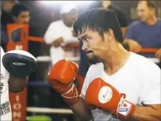  ?? Yam G-Jun/Associated Press ?? Manny Pacquiao, 39, fights for the first time since losing his last bout a year ago, but says “everything is fine.”