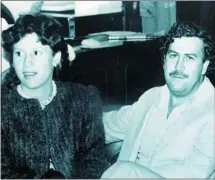  ??  ?? Colombian drug lord Pablo Escobar and his wife, Victoria Henao, are shown in this photograph when Escobar was a member of the Colombian Congress in 1983.