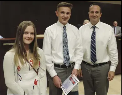  ??  ?? Springvill­e Junior High School students Kate Southern and Austin Ewell are shown with Springvill­e City Councilman Jason Miller. The two students were presented with Mayor’s Recognitio­n Awards at a city council meeting in November.