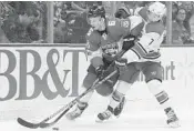  ?? JOE SKIPPER/AP ?? Defenseman Alexander Petrovic, left, quietly had a solid season on the third pairing in front of the goaltender­s.