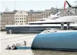  ??  ?? Show of wealth: two superyacht­s, the Aviv (front) and the Elandess, together on the Thames this month