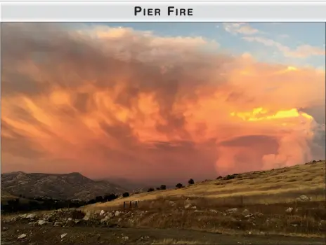  ?? PHOTO VIA CALFIRE WEBSITE ?? Smoke from the Pier Fire hangs over the foothills Wednesday.