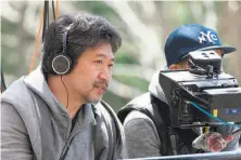  ?? Sony Pictures Classics 2015 ?? Hirokazu Kore-eda, shown filming “Our Little Sister,” is known for crafting deeply intimate family dramas.