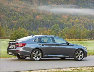  ?? HONDA ?? The 2018 Honda Accord Touring is available with either a 1.5-liter or a 2.0-liter engine. Both are turbocharg­ed.