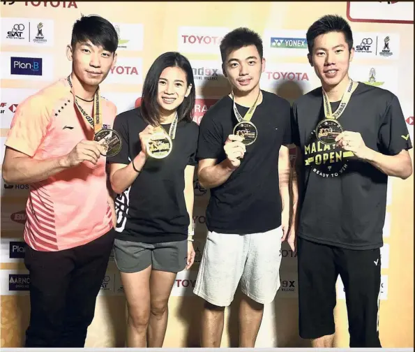  ??  ?? Fantastic four: (from left) Chan Peng Soon, Goh Liu Ying, Tan Wee Kiong and Goh V Shem posing with their winners’ medals at the Thailand Masters in Bangkok.