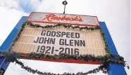  ?? JOHN MINCHILLO/ASSOCIATED PRESS ?? A sign is displayed in honor of astronaut John Glenn in his hometown, New Concord, Ohio, on Friday.