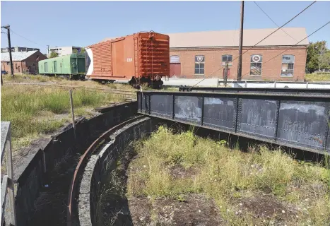  ??  ?? Above: A shot of the remains of the original roundhouse turntable. Right: Qualicum Beach train station.