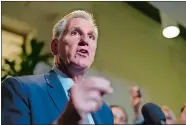  ?? J. SCOTT APPLEWHITE/AP PHOTO ?? Speaker of the House Kevin McCarthy, R-Calif., briefs reporters Tuesday after a closed-door Republican Conference meeting on how to agree on a path to funding the government at the Capitol in Washington.