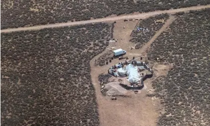  ?? ?? A file photo shows a rural compound during an unsuccessf­ul search for the missing boy in New Mexico. Photograph: AP