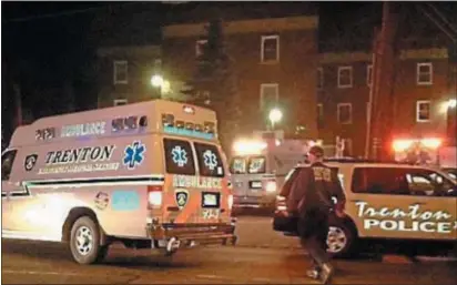  ?? TRENTONIAN FILE PHOTO ?? Trenton Police and medics respond to a shooting.