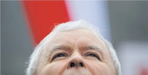 ?? REUTERS ?? Jaroslaw Kaczynski, leader of the ruling Law and Justice Party, attends a pro-government demonstrat­ion in Warsaw, Poland in December last year. He drives the government’s agenda with a steady purpose — to fashion Poland into a state guided by...