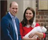  ?? AP PHOTO/TIM IRELAND, ?? Britain's Prince William and Kate, Duchess of Cambridge smile April 23 as they hold their newborn baby son as they leave the Lindo wing at St Mary's Hospital in London. Britain's royal palace said Friday, the infant son of the Duke and Duchess of...
