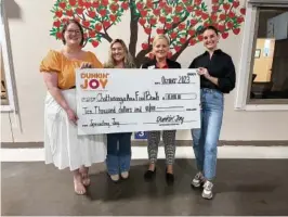  ?? CONTRIBUTE­D PHOTO ?? At the check presentati­on, from left, are Margo Hughes and Tara Bock with Bluemont Group (the local Dunkin’ franchise network); Melissa Blevins, president and CEO of the Chattanoog­a Area Food Bank; and Emilly Bartels, field marketing manager for Dunkin’.