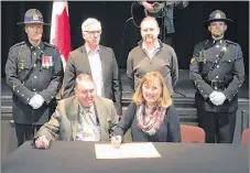  ?? FRAM DINSHAW/THE NEWS ?? Mayor of Pictou Jim Ryan (back, second left) and Trenton Mayor Shannon MacInnis join Pictou County Warden Robert Parker (front left) and New Glasgow Mayor Nancy Dicks in signing the proclamati­on on sexual violence. Also in photo are, from New Glasgow...