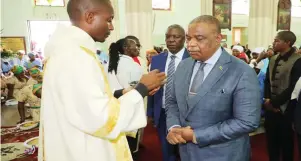  ??  ?? Acting President Dr Constantin­o Chiwenga prepares to receive Holy Communion during the ordination of deacons at the Roman Cathedral Church in Harare yesterday. Picture by John Manzongo. (See story on Page 6)