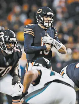  ?? JOSE M. OSORIO/CHICAGO TRIBUNE ?? Bears quarterbac­k Mitch Trubisky directs teammates at the line against the Eagles during an NFC wild-card game, the Bears’ only postseason game since drafting Trubisky.