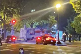  ?? (AP/Benjamin Berger) ?? A box truck is seen crashed into a security barrier Monday night at a park across from the White
House in Washington.