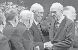  ?? Rick Bowmer photos / Associated Press ?? The longest-serving member of the Quorum of the Twelve Apostles of The Church of Jesus Christ of Latter-day Saints, Russell M. Nelson, right, is excpected to become the next prophet and head of the church. Nelson, a former heart surgeon, is 93.