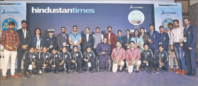  ?? SANJEEV SHARMA/HT ?? ACHIEVERS ALL: From left (standing): Wushu champ Narender Garewal, rower Sukhmeet Singh, shooter Manu Bhaker, INS Tarini crew Lt Payal Gupta, Kashmir Administra­tive Service officer Anjum Bashir Khan Khattak, martial arts coach Faisal Ali Dar, chief guest and Olympic gold medallist Abhinav Bindra, cricketer Siddharth Kaul, printmakin­g artist Rahul Dhiman, artist Ashima Raizada, hockey player Navneet Kaur, Panjab University student council president Kanupriya, designer Seerat Virdi, skier Jagdish Rawat, para shooter Manish Narwal, poet Harmanjeet Singh and athlete Manjit Singh Chahal (extreme right). Seated from left: Under16 Indian football players Varsha, Manisha, Anju, Poonam, Kavita, Nisha; and para athlete Amit Balyan, shooters and twins Udayveer and Vijayveer; and rising football players Kiran and Ritu.