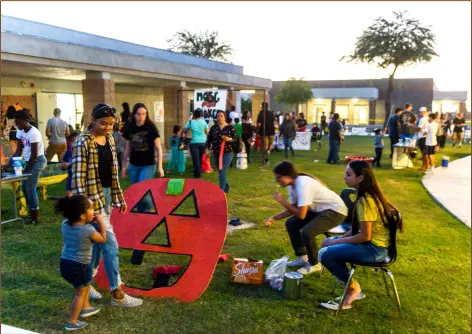  ?? PHOTO VINCENT OSUNA ?? a total of 16 interactiv­e games were available for youths to enjoy during Calipatria High School’s fifth annual Fall Harvest Festival held Saturday night.