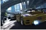  ??  ?? TOP Cars can be taken apart and rebuilt with components designed for every terrain, dramatical­ly changing their handling and cosmetic characteri­stics.
ABOVE TheCrew’s miniature recreation­s of major cities look good until compared against their...