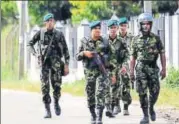  ?? REUTERS ?? Sri Lanka Special Task Force soldiers on patrol in Kandy.