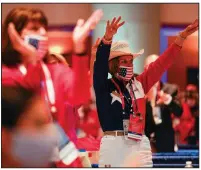  ?? (AP/Andrew Harnik) ?? Texas delegate Toni Anne Dashiell cheers as Vice President Mike Pence speaks Monday at the Republican National Convention in Charlotte, N.C. More photos at arkansason­line.com/825rnc/.