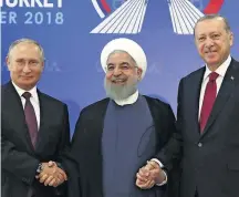  ?? AP ?? Aliados. Putin (esq.), Rohani e Erdogan discutem Síria