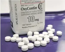  ?? AP FILE PHOTO ?? BETTER CONTROL: The state’s new prescripti­on monitoring system will give doctors more up-to-date informatio­n that should reduce scripts for opioids.