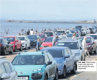  ??  ?? Car- azy There’s been anger over plans to ban vehicles for Ayr’s esplanade