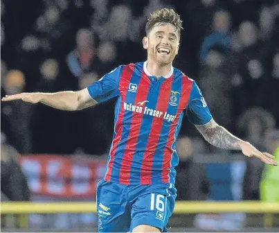  ?? Picture: SNS. ?? Doing his best for Caley Thistle: midfielder Greg Tansey has rejected suggestion­s he is not concerned about the club’s looming relegation ahead of his move to Aberdeen.