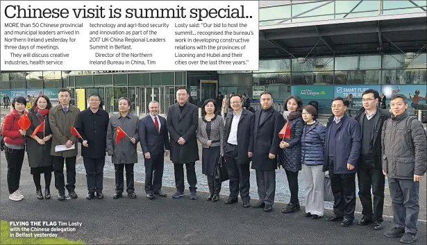  ??  ?? FLYING THE FLAG Tim Losty with the Chinese delegation in Belfast yesterday