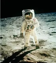  ?? NEIL ARMSTRONG/THE ASSOCIATED PRESS FILE PHOTO ?? On July 20, 1969, astronaut Edwin E. Aldrin Jr., walks near the lunar module during the Apollo 11 extravehic­ular activity.