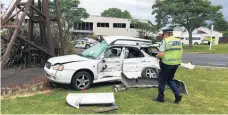  ?? Picture / Supplied ?? A critically injured person was cut from this car after it collided with a truck in Waihi yesterday.