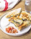  ?? SARAH CROWDER/ASSOCIATED PRESS ?? Spinach, mushroom and chicken quesadilla­s are fast for the cook and filling for the kids.