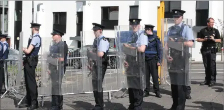  ??  ?? Gardai with public order shields line up at the entrance to connaughto­n road car park last Wednesday morning .